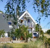 Ferienwohnung Ostwind auf Fehmarn: Meerblick, Terrasse & Kamin