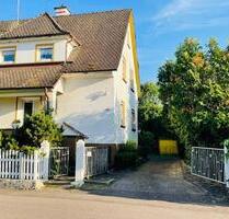 Freistehendes 2 Fam.Haus mit Baugrundstück & sehr schönem Garten - March