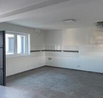 Erstbezug nach Kernsanierung! Schöne Maisonettewohnung mit Balkon und Garten. - Altrip