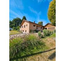 Bungalow mit Einliegerwohnung und Baugrundstück - Flammersfeld