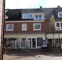 Dachgeschosswohnung mit EBK, kl. Balkon und Garage in Wittmund (Fußgängerzone)