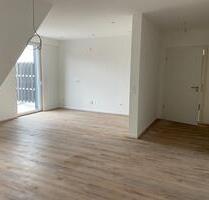 Erstbezug: Lichtdurchflutete Dachgeschosswohnung mit Balkon in ze - Warendorf