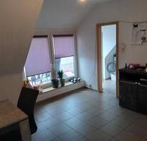 Drei Zimmer Dachgeschosswohnung mit kleinem Balkon - Schüttorf