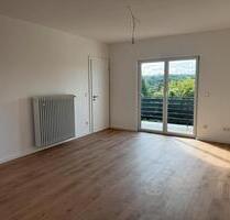 4-Zimmer-Wohnung im OG mit 2 Balkonen, Keller & Garten - Homburg