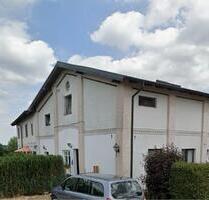 Erdgeschosswohnung mit Terrasse im ländlichen Mehrfamilienhaus - Sandesneben