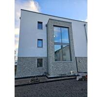 Neubauwohnung zu vermieten! - 1.199,00 EUR Kaltmiete, ca.  113,00 m² in Brakel (PLZ: 33034)