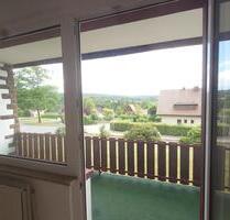 Gepflegte 2 Zimmer Wohnung mit Balkon, großem Garten optional mit Stellplatz - Holzminden