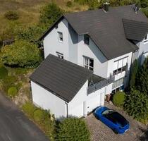 Wohnhaus mit Einliegerwohnung - 410.000,00 EUR Kaufpreis, in Königheim (PLZ: 97953)