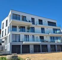 Traumhafte 3-Raum-Wohnung mit Terrasse, Garten & Garage – Erstbezug am Zwenkauer See