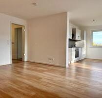 3-Zimmer-Neubauwohnung mit offener Wohnküche und Balkon – zu vermieten in Hennstedt