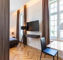 Historische Eleganz & moderner Komfort – Wohnen auf Zeit mitten in München Business
