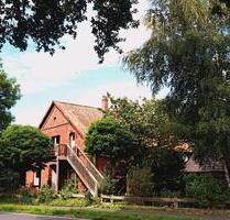 Mehrfamilienhaus mit Potenzial auf großem Grundstück - Wagenfeld