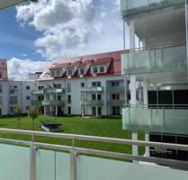 Neuwertige Wohnung mit 3,5 Zimmern sowie Balkon und EBK i - Baiersdorf