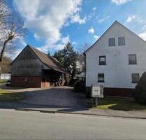Mehrfamilienhaus mit Einliegerwohnung und Baugrundstück - Hatzfeld (Eder)
