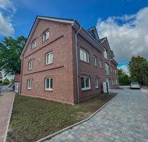 6530 - Stilvoll Wohnen im Neubau – Lichtdurchflutete 2-Zimmer-Wohnung mit Aufzug und Balkon - Edewecht