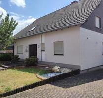 Großzügige 4,5-Zimmer-EG-Wohnung mit Südgarten in Mastershausen