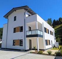 Moderne und energetisch erstklassige 3-Zimmer-Wohnung mit Dachterrasse in ruhiger Lage von Winzer!