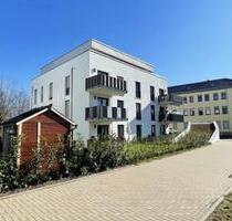 Neubau mit Stil: 2-Zimmer-Wohnung mit Garten und Einbauküche in Coswig zu vermieten!