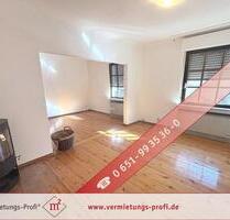 Trier-Pfalzel: Charmante 2-Zimmer-Altbauwohnung auf 73 m² mit Wintergarten, Terrasse und Garten