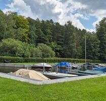 Grundstück mit Bungalow, Bootsliegeplatz und Motorboot - Rheinsberg