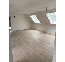 Moderne 2-Zimmer-Dachgeschosswohnung (KfW 55) - Breitscheid