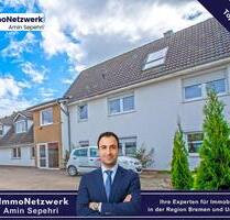 Moderne 3-Zimmer-Wohnung mit Einbauküche, Garten und Balkon in Syke-Barrien