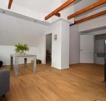 Charmante, großzügige Dachgeschosswohnung mit Loggia und Einbauküche in Friesoythe