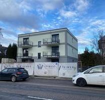 Neubau Erstbezug: Stilvolle Erdgeschosswohnung mit Einbauküche von 