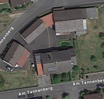 Wohnhaus mit Einliegerwohnung, und Halle in Siedlungslage - Karbach