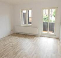 Freundliche Wohnung mit MINI -EBK & kleiner Terrasse mitten in der INNENSTADT! - Güstrow