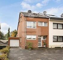 Reihenendhaus mit großem, idyllischen Garten und Garage in zentraler Lage in Bergheim-Kenten.