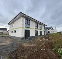 Neubau Doppelhaushälfte mit Erdwärme in Fernwald Annerod