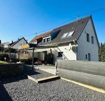 Gepflegtes Einfamilienhaus mit Terrasse, Garten und Garage in Heusweiler - Holz