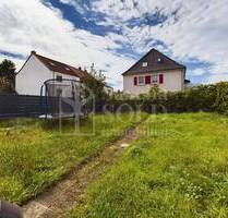 Wohn- und Geschäftshaus in St. Ingbert mit großer Wohnung, Gewerbeeinheit, Garten und Garagen - Sankt Ingbert