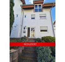 vermietetes Reihenendhaus mit kleinem Grundstück als lukrative Investitionsmöglichkeit - Queidersbach