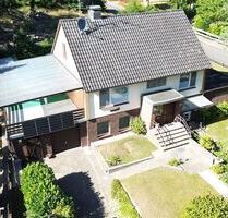 Einfamilienhaus mit Einliegerwohnung in Waldrandlage, ideale Kombination aus Wohnen und Rendite - Steyerberg