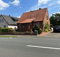 Gelegenheit: Niedliches Einfamilienhaus mit viel Wald- u. Grünfläche u. einem Baugrundstück - Siedenburg