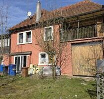 Einfamilienhaus mit Garten und Garage in 97450 Arnstein (ID 10542)