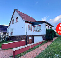 HORN IMMOBILIEN++ Burg Stargard, Einfamilienhaus mit Garage und geschlossener Veranda, Randlage