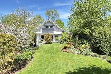 Charmantes Einfamilienhaus mit flexibler Raumaufteilung und Gartenidylle - Brieselang