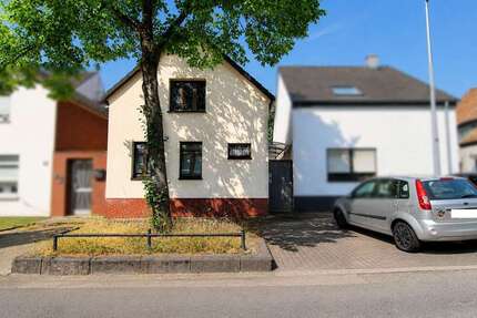 Haus zum Kaufen in Köln Godorf 385.000,00 € 102 m² - Köln / Godorf