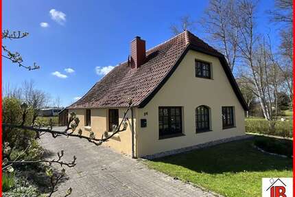 Haus zum Kaufen in Butjadingen 249.000,00 € 137.53 m²