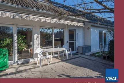 Erdgeschoss-Wohnung mit großer Terrassenlandschaft und bes. Ausstattung im 3FH. Randlage, Carport. - Nidderau Ostheim