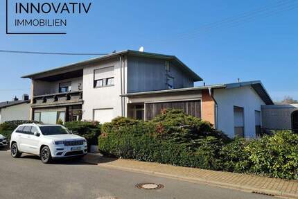 Großes Areal mit 480 m² Wohnhaus Ein-Dreifamilien und 2 Lagerhallen in ruhiger Lage von Urexweiler - Marpingen