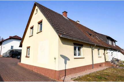 GLOBAL INVEST SINSHEIM | Schöne Doppelhaushälfte mit Schuppen und zwei Stellplätzen in Dühren - Sinsheim / Dühren