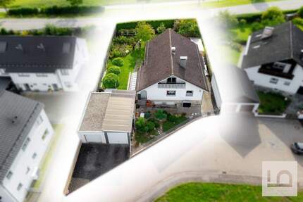 *PROVISIONSFREI* Solides Einfamilienhaus mit 5 ZKB zuzügl. Souterrain 2 ZKB, DG vorbereitet, Grund 950 qm, 2 Garagen - Böhmfeld