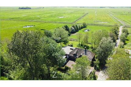 Energetisch modernisiert: Reetdachkate mit Einliegerwohnung** - Katharinenheerd