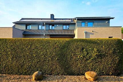 Erstbezug! Helle 3ZKB EG Wohnung m Terrasse u. eigenem Gartenteil - Löningen
