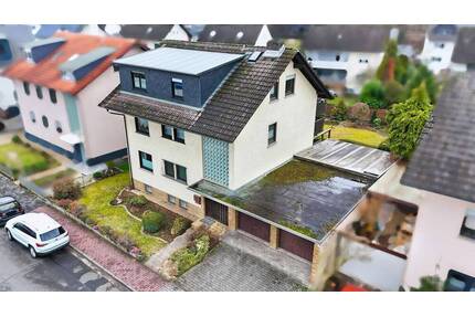 Provisionsfreies Mehrfamilienhaus mit Ausbaupotenzial in Toplage Bruchköbel