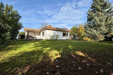 Für die Familie: Modernisierter Bungalow mit Gartenparadies in LangenOberlinden